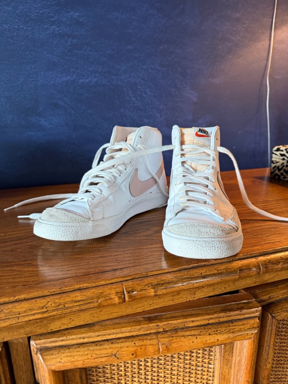 Nike Women’s White High-Top Sneakers with Light Pink Swoosh